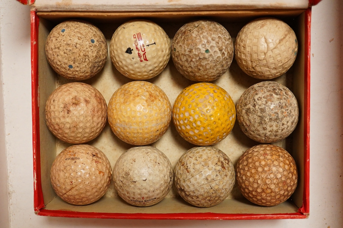 A box of vintage golf balls to include Dunlop